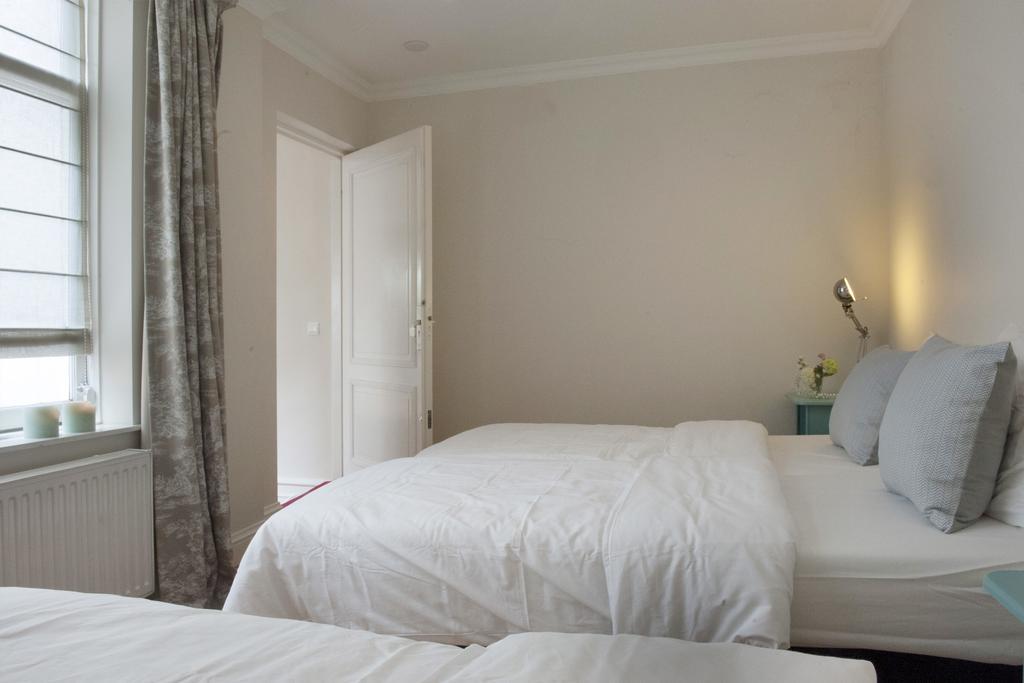 Canal Studio Apartment Amszterdam Szoba fotó